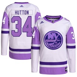 Grant Hutton New York Islanders Men's Adidas Authentic White/Purple Hockey Fights Cancer Primegreen Jersey